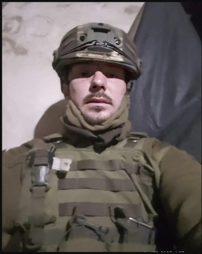 Роман Галан