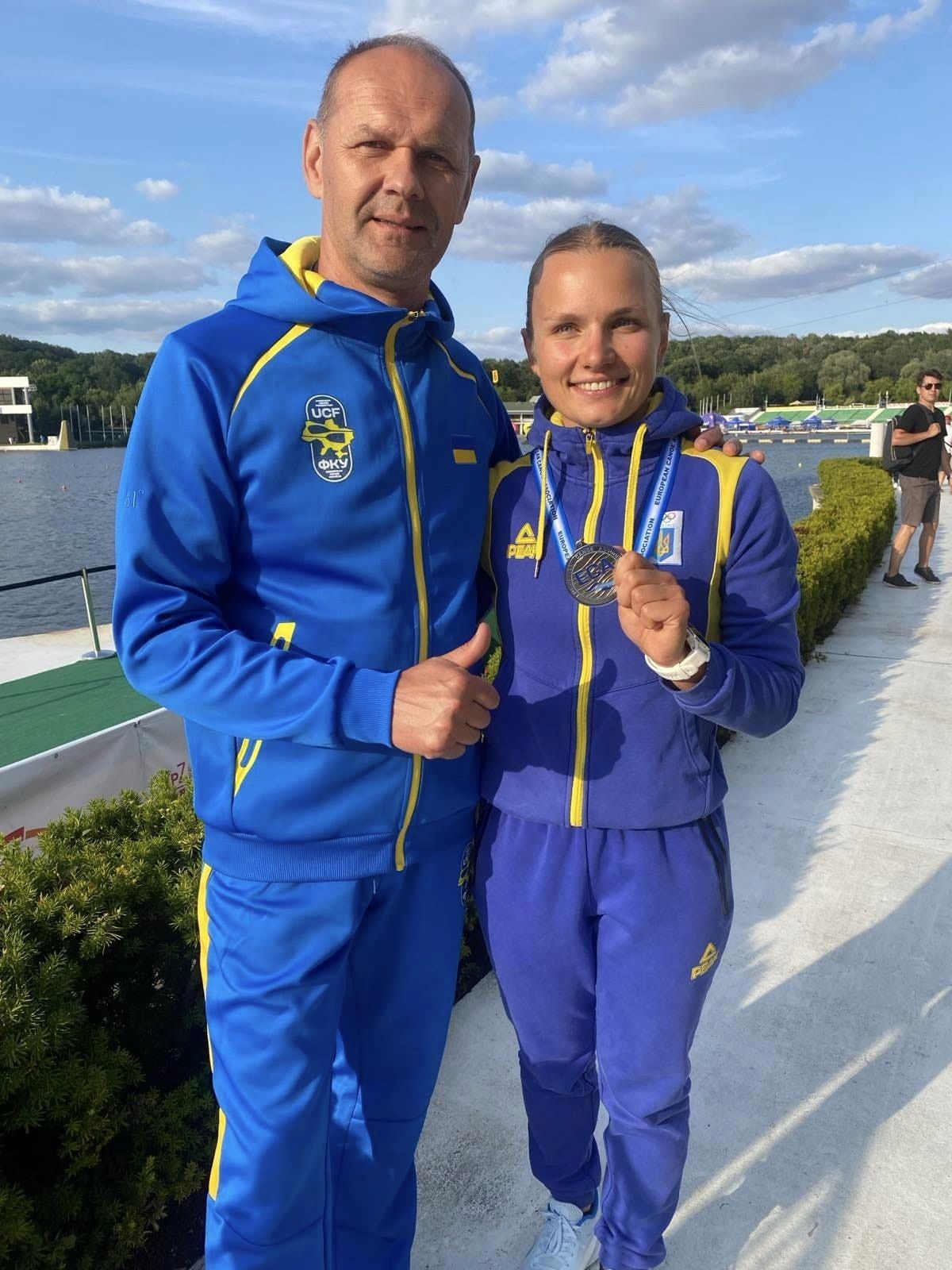 Олена Циганкова разом із тренером Леонідом Камлочуком.